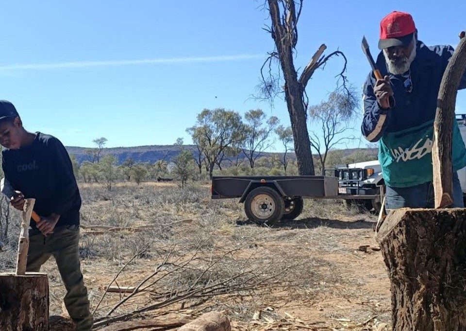 Robert Hoosan, our SFLTFL Cultural Consultant, demonstrates how to make a boomerang at the Desert Knowledge Precinct