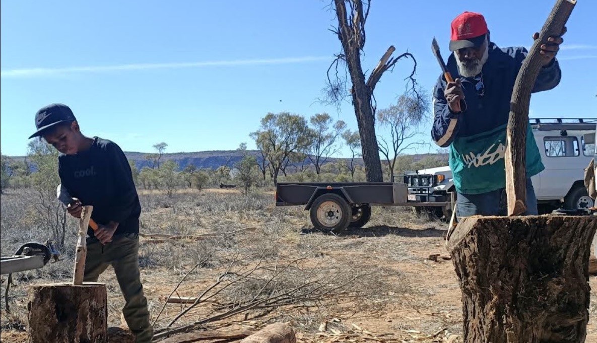 Robert Hoosan, our SFLTFL Cultural Consultant, demonstrates how to make a boomerang at the Desert Knowledge Precinct